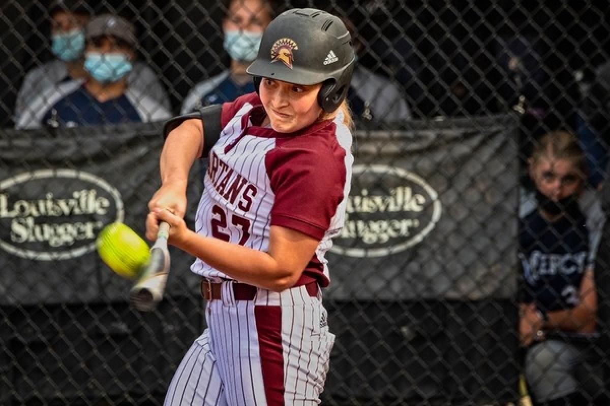 Behind 13 innings of brilliant pitching of Carissa Della Vecchi