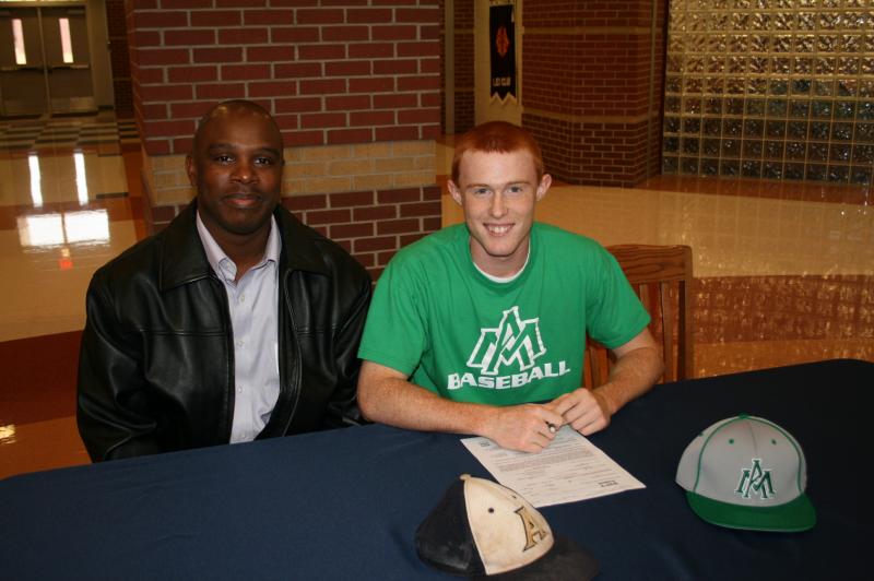 Justin on signing day with U of Arkansas-Monticello