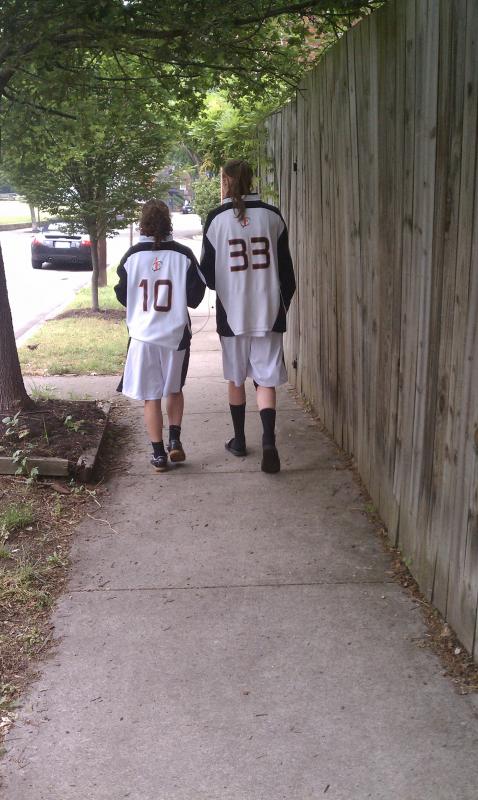 Kaitlyn and Jojo wlaking to get lunch between games at the Cap City tournament