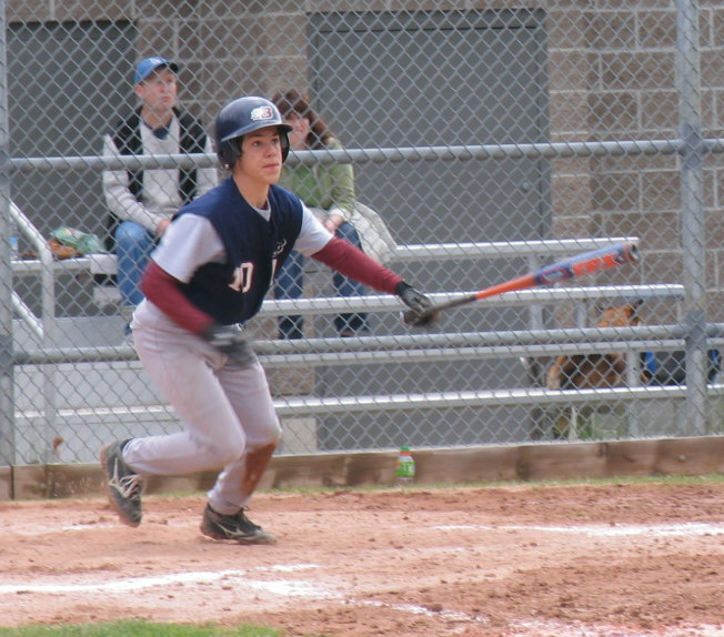Adam smacks one vs Port Coquitlam at Bird Field