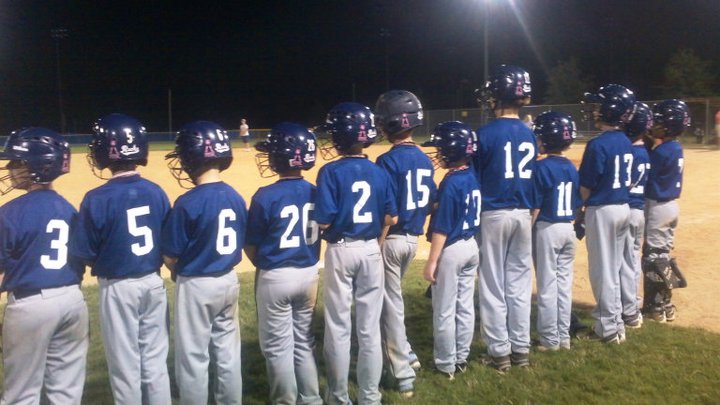 Rocks 11U October Breast Cancer helmets.