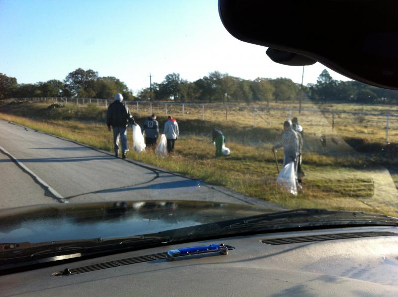 the team pickin up trash in the community...