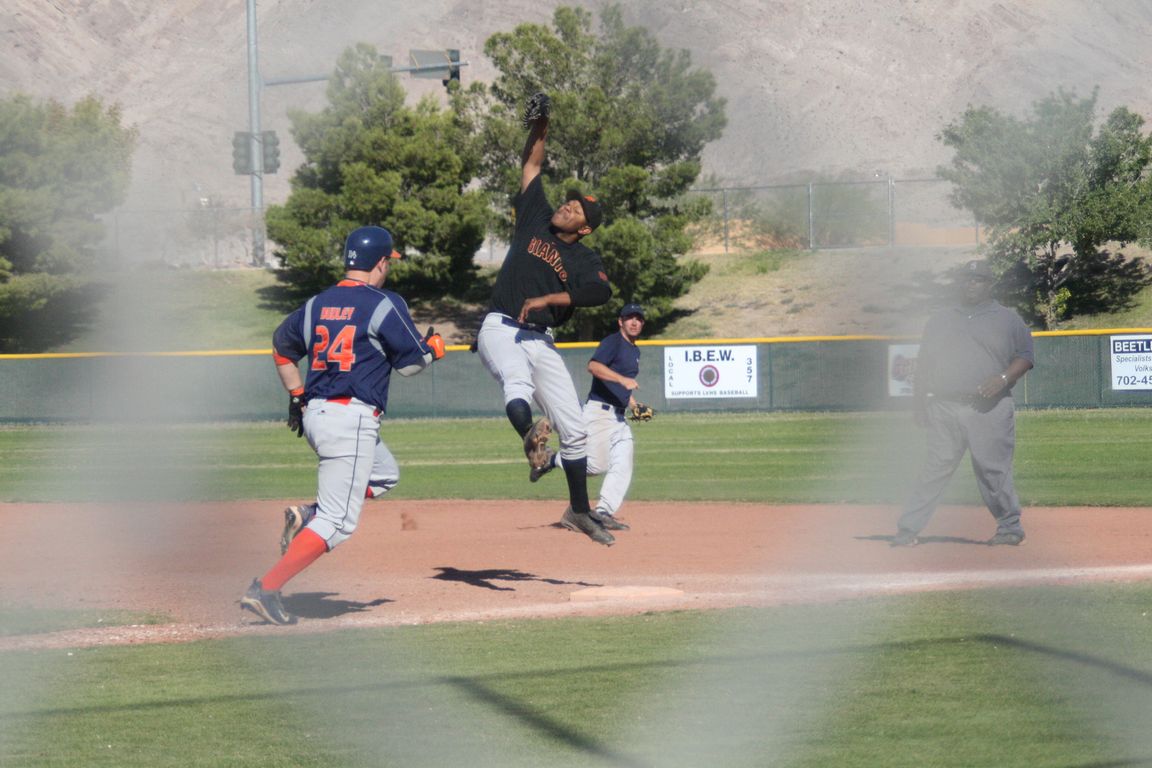Luke hustles to first and the pitcher sails it into right field